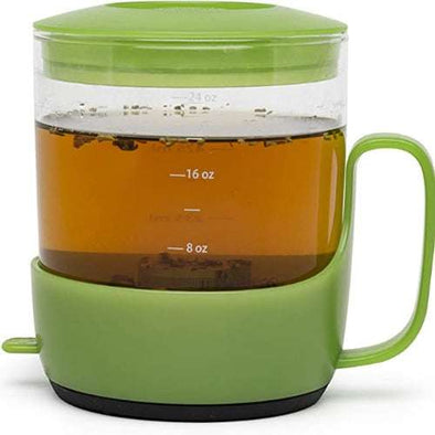 Addison Borosilicate Glass Tea Steeper with Stainless Steel Filter filled with tea on white background