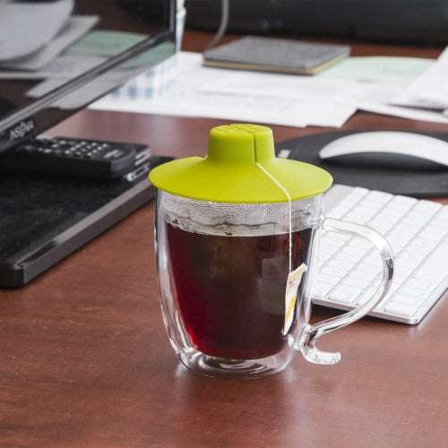 Double Wall Glass Mug with tea on desk