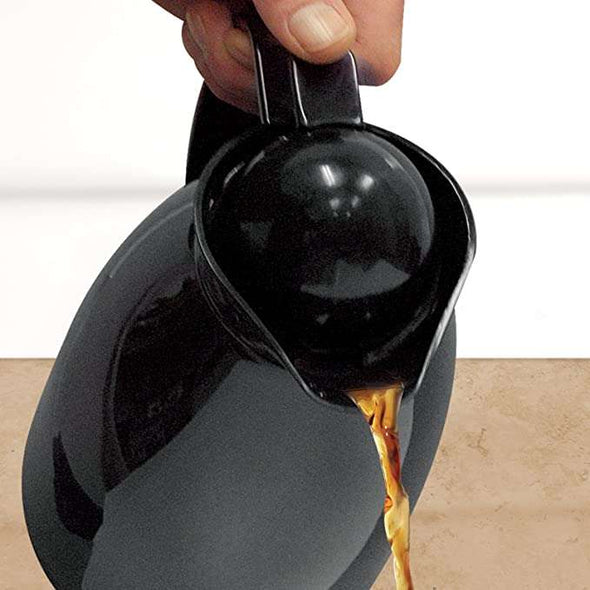 Thermal Carafe With Glass Lining pouring tea