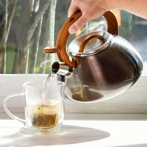 Avalon Whistling Kettle being poured into a cup of tea