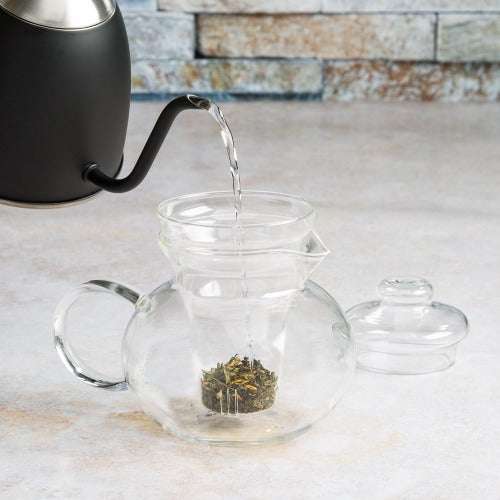 Blossom Teapot adding water on counter