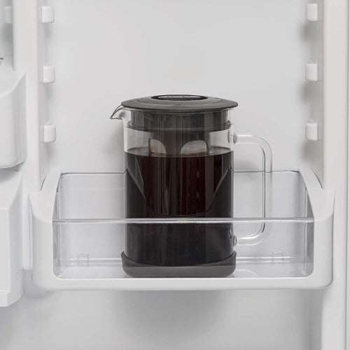 Pace Cold Brew Maker with cold brew on fridge door