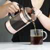 Melrose Cup Coffee Press pouring coffee into coffee cup